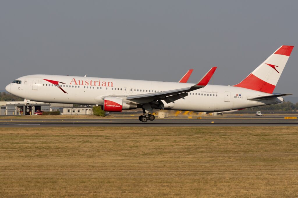 Austrian Airlines Boeing 767-300ER OE-LAZ landing in its earlier livery with red engine covers.